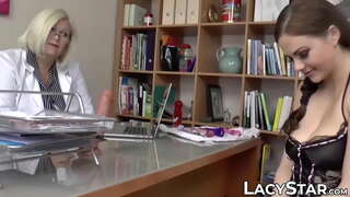 Busty GILF dominates a hot young babe